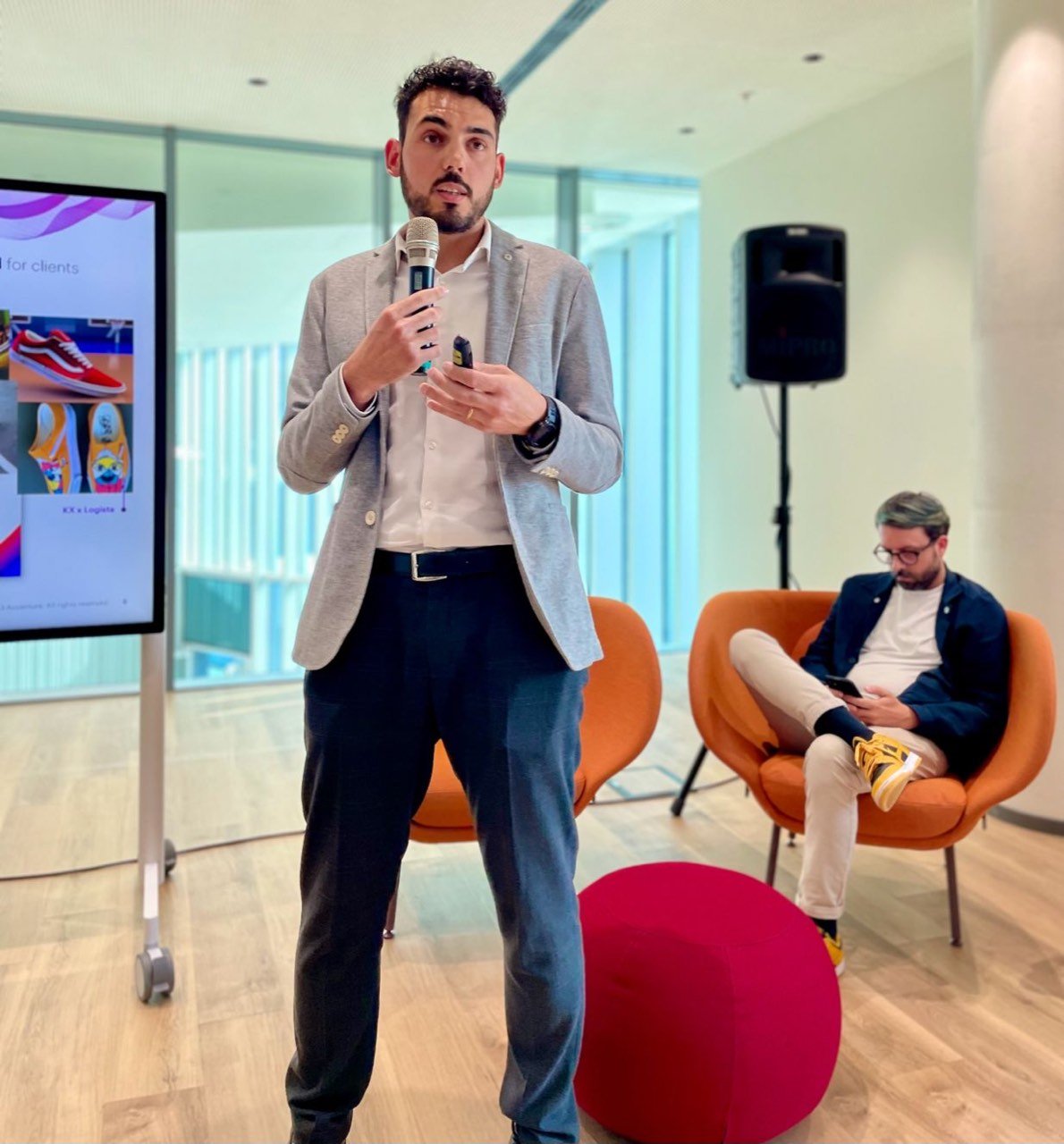 Speaker with a microphone presenting on blockchain